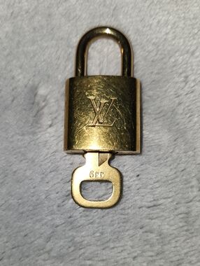 Louis Vuitton Shiny Gold Padlock with LV Monogram 449